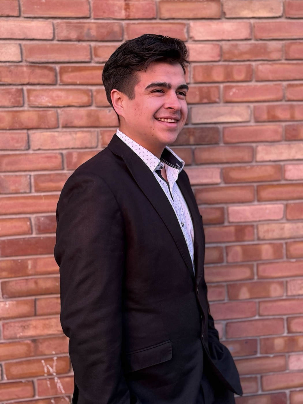 Andrew Little, Founder of LUX 14 Inc., in professional attire