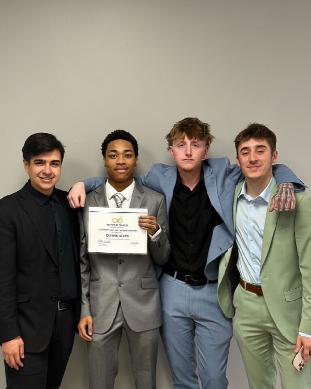 LUX 14 Inc. team celebrating achievement award